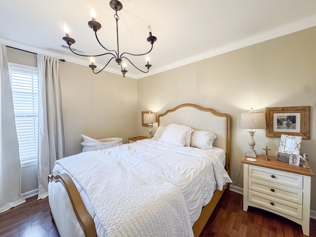 bedroom with ornamental molding, baseboards, dark wood-style flooring, and a chandelier