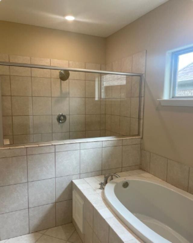 7718 Parkridge Dr, Southaven, MS 38671 - full bathroom featuring a bath, a stall shower, recessed lighting, and tile patterned floors