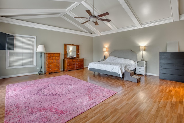 bedroom featuring vaulted ceiling with beams, a ceiling fan, baseboards, and light wood finished floors