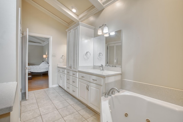 bathroom with tile patterned floors, a sink, connected bathroom, a tub with jets, and double vanity