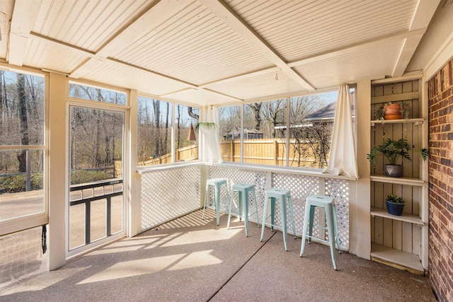 sunroom featuring a wealth of natural light