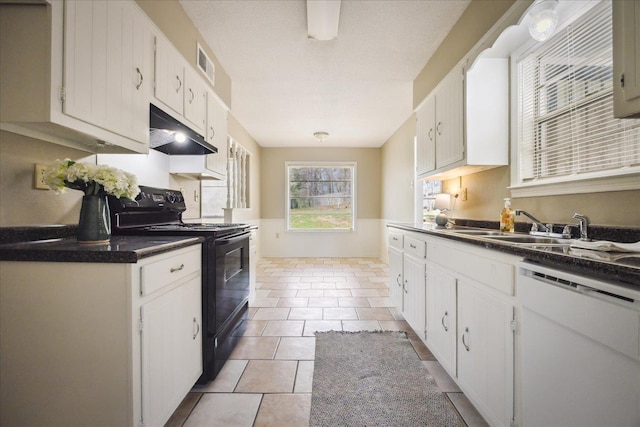 kitchen featuring visible vents, electric range, a sink, under cabinet range hood, and dishwasher