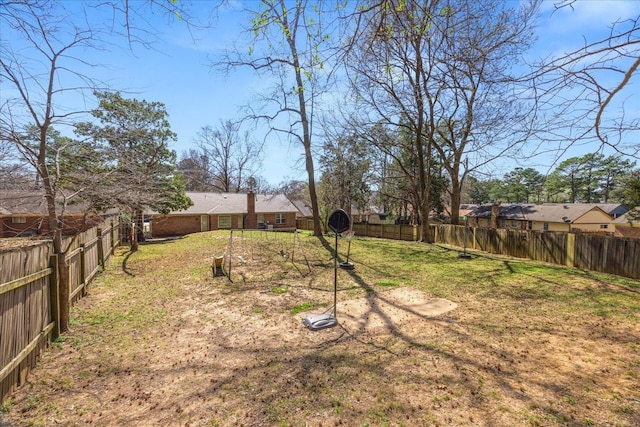 view of yard featuring a fenced backyard