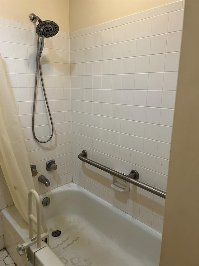 full bathroom with shower / tub combo with curtain