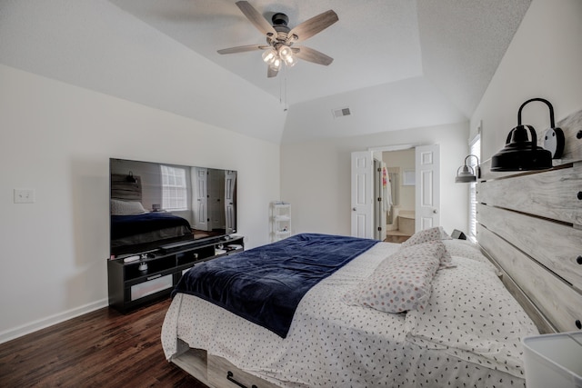 bedroom with visible vents, ceiling fan, baseboards, vaulted ceiling, and wood finished floors