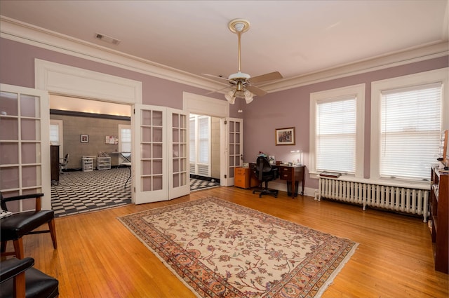 1860 Central Ave, Memphis, TN 38104 - office with a ceiling fan, wood finished floors, french doors, radiator, and crown molding