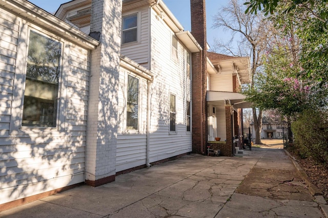 1860 Central Ave, Memphis, TN 38104 - view of side of home with a chimney