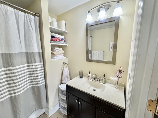 full bath with vanity, a shower with curtain, and tile patterned flooring