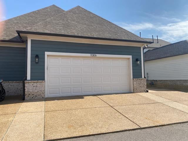 garage with driveway