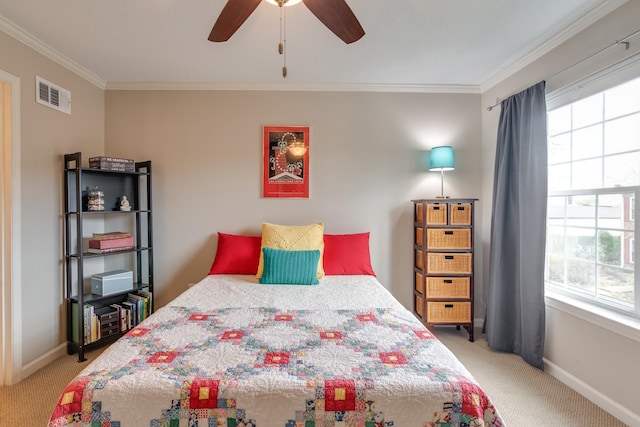 bedroom featuring visible vents, baseboards, light colored carpet, and ornamental molding