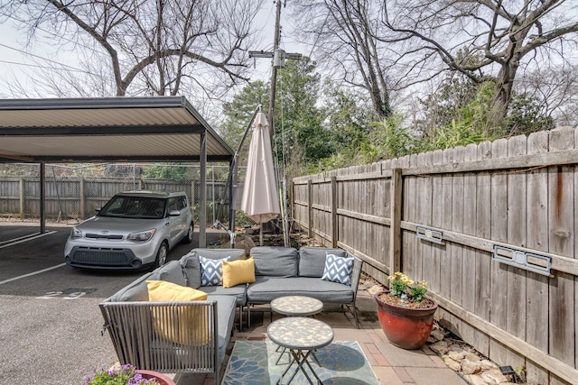 view of patio / terrace with outdoor lounge area and a fenced backyard