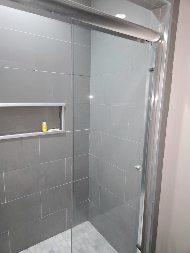 bathroom with a stall shower