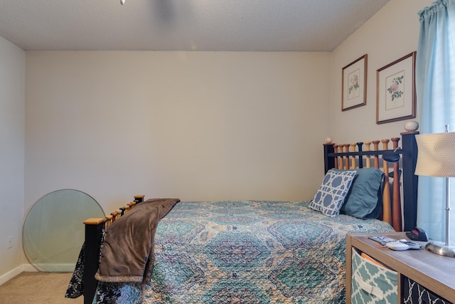 9995 Woodland Birch Dr, Lakeland, TN 38002 - carpeted bedroom with baseboards and a textured ceiling