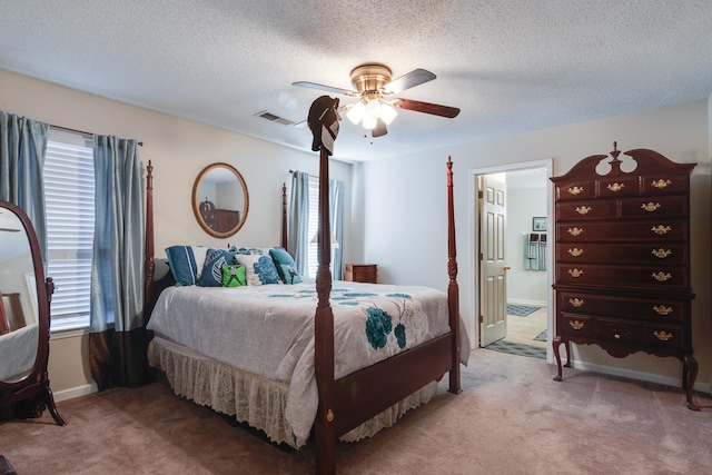 9995 Woodland Birch Dr, Lakeland, TN 38002 - bedroom featuring light carpet, visible vents, a textured ceiling, and ceiling fan