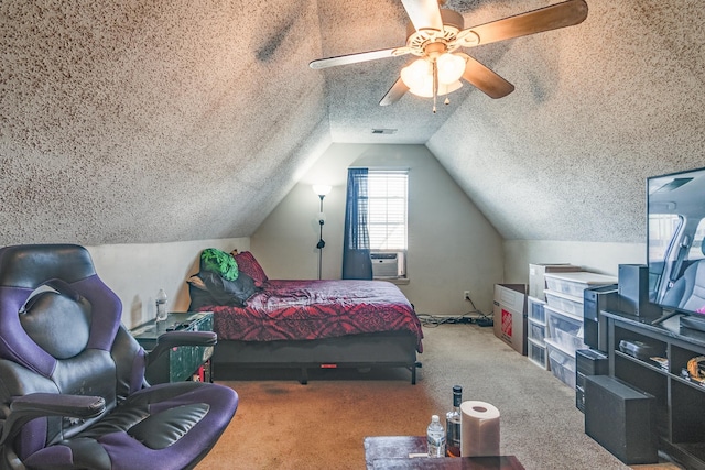 9995 Woodland Birch Dr, Lakeland, TN 38002 - bedroom with a ceiling fan, carpet, visible vents, vaulted ceiling, and a textured ceiling