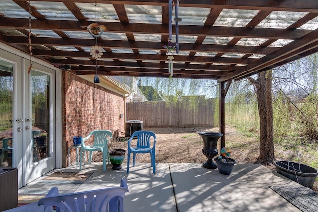 9995 Woodland Birch Dr, Lakeland, TN 38002 - view of patio featuring central air condition unit, french doors, a pergola, and fence