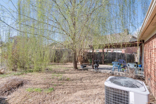 9995 Woodland Birch Dr, Lakeland, TN 38002 - view of yard featuring central air condition unit, a patio, and fence