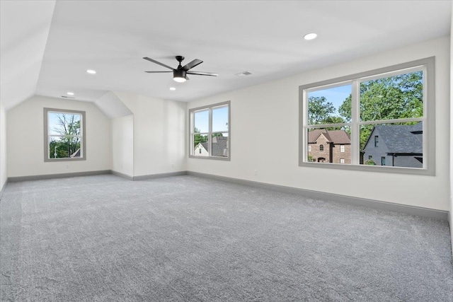 additional living space with recessed lighting, carpet floors, a ceiling fan, and baseboards