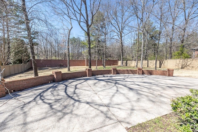 2793 Bayhill Woods Dr, Collierville, TN 38017 - fenced backyard with a patio area