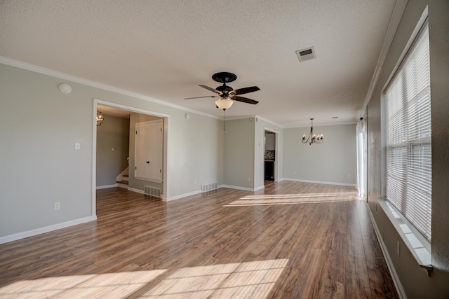 12065 Hidden Trl, Arlington, TN 38002 - unfurnished living room with visible vents, a textured ceiling, wood finished floors, and ceiling fan with notable chandelier