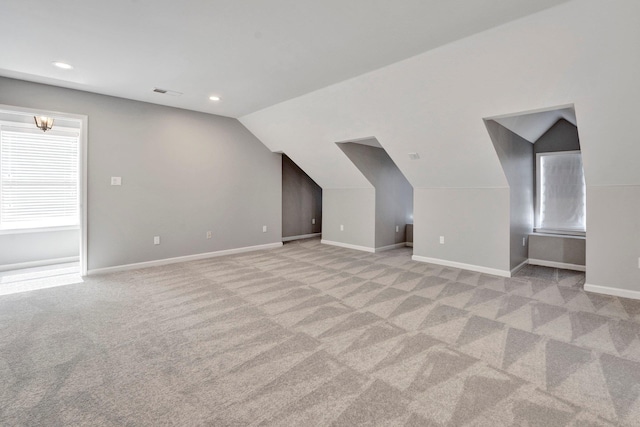 bonus room with recessed lighting, baseboards, carpet, and vaulted ceiling