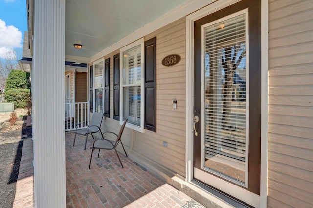view of patio featuring a porch