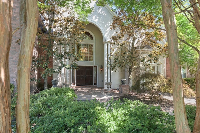 7570 Chapel Ridge Dr, Memphis, TN 38016 - doorway to property with stucco siding