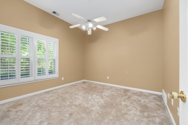 7570 Chapel Ridge Dr, Memphis, TN 38016 - empty room featuring visible vents, light colored carpet, baseboards, and ceiling fan