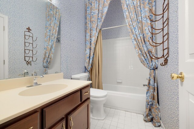 7570 Chapel Ridge Dr, Memphis, TN 38016 - full bathroom with vanity, shower / tub combo, toilet, and tile patterned flooring