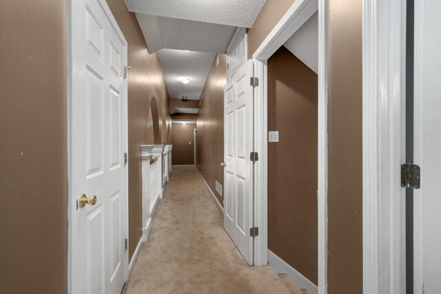 7570 Chapel Ridge Dr, Memphis, TN 38016 - corridor with visible vents, light carpet, and baseboards