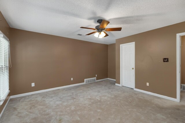 7570 Chapel Ridge Dr, Memphis, TN 38016 - unfurnished bedroom featuring visible vents, a textured ceiling, and baseboards