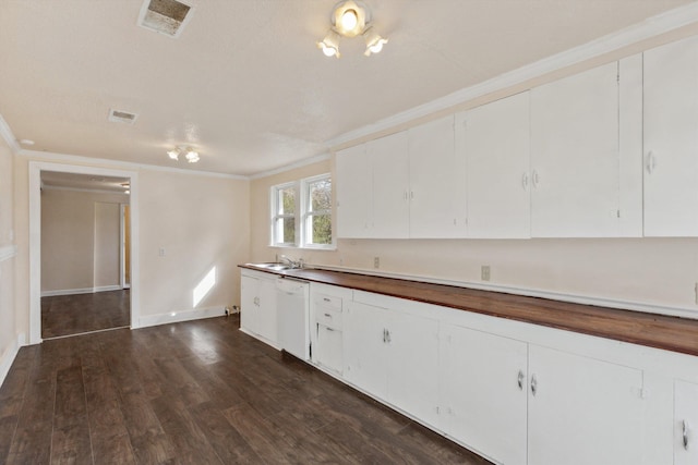 8457 Kerrville-Rosemark Rd, Millington, TN 38053 - kitchen featuring crown molding, visible vents, dark wood-style flooring, and white dishwasher