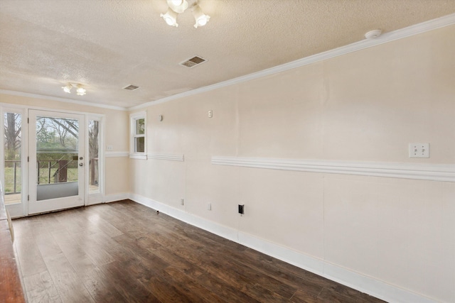 8457 Kerrville-Rosemark Rd, Millington, TN 38053 - spare room featuring visible vents, a textured ceiling, wood finished floors, and crown molding