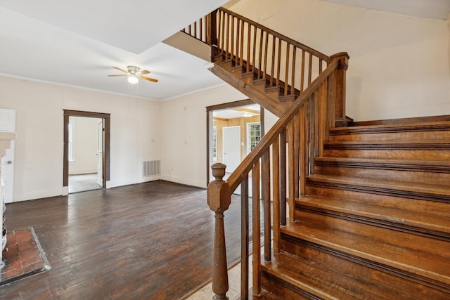 8457 Kerrville-Rosemark Rd, Millington, TN 38053 - staircase featuring visible vents, ornamental molding, wood finished floors, baseboards, and ceiling fan