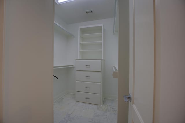 1844 Penshurst Dr, Collierville, TN 38017 - walk in closet with marble finish floor and visible vents