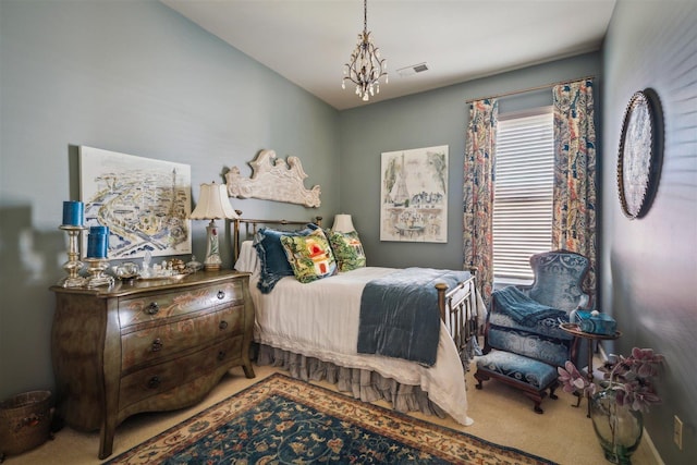 carpeted bedroom featuring visible vents