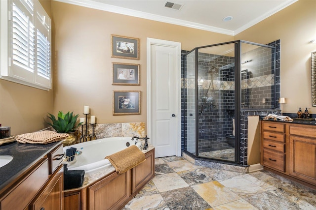 bathroom featuring a stall shower, visible vents, a garden tub, vanity, and ornamental molding