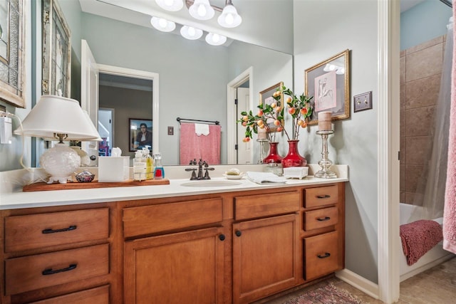 full bathroom with vanity and tile patterned floors