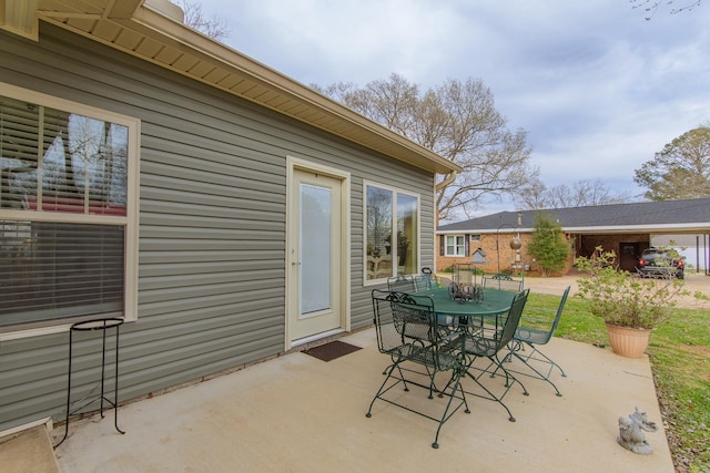 view of patio with outdoor dining area