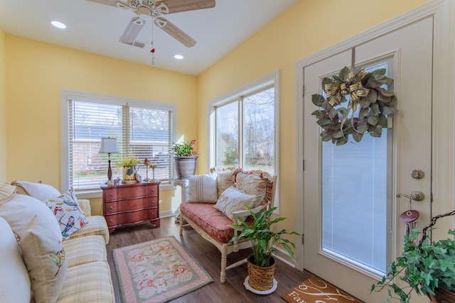 living area with visible vents, wood finished floors, recessed lighting, and a ceiling fan