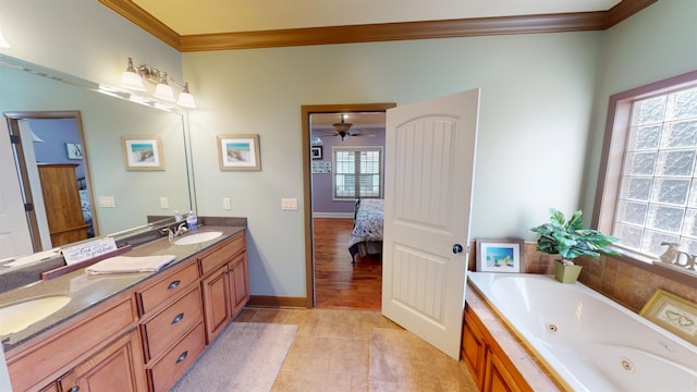 100 Carefree Ln, Counce, TN 38326 - bathroom featuring a sink, connected bathroom, a whirlpool tub, tile patterned floors, and ornamental molding