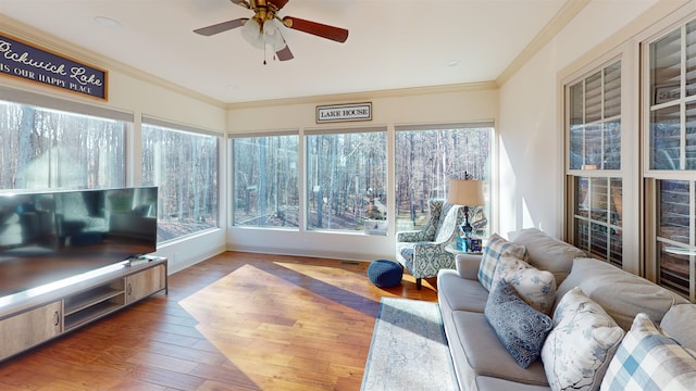 100 Carefree Ln, Counce, TN 38326 - sunroom / solarium with baseboards, ornamental molding, and wood finished floors