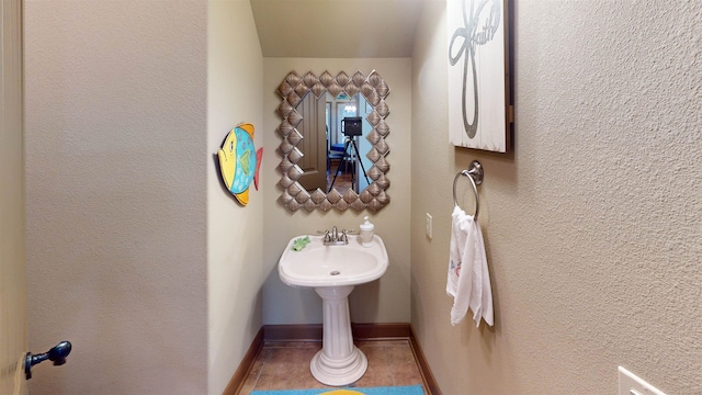 100 Carefree Ln, Counce, TN 38326 - bathroom featuring tile patterned flooring and baseboards