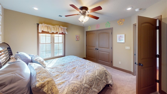 100 Carefree Ln, Counce, TN 38326 - bedroom with carpet flooring, a closet, ceiling fan, visible vents, and baseboards