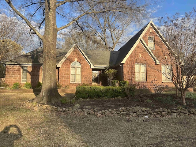 view of front of property with brick siding
