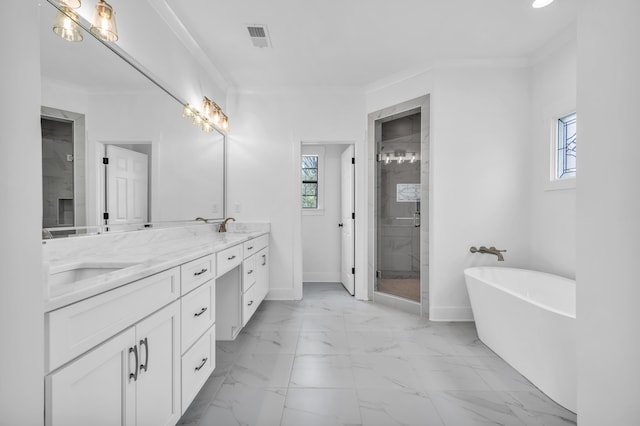 bathroom with marble finish floor, a wealth of natural light, visible vents, and a shower stall