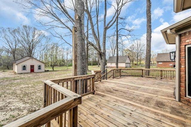 deck featuring an outdoor structure