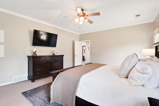 bedroom with carpet, crown molding, and visible vents