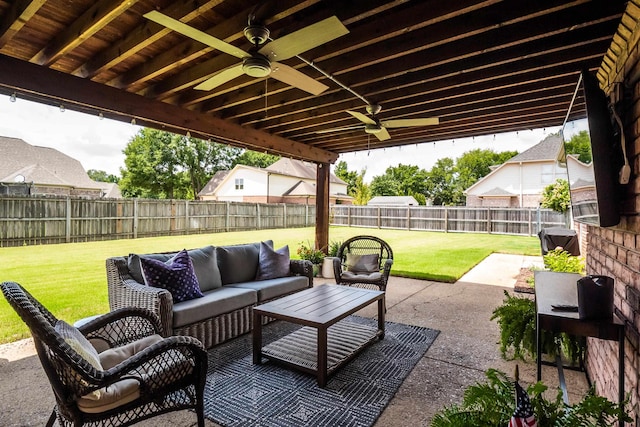 view of patio / terrace featuring a fenced backyard, an outdoor hangout area, and ceiling fan