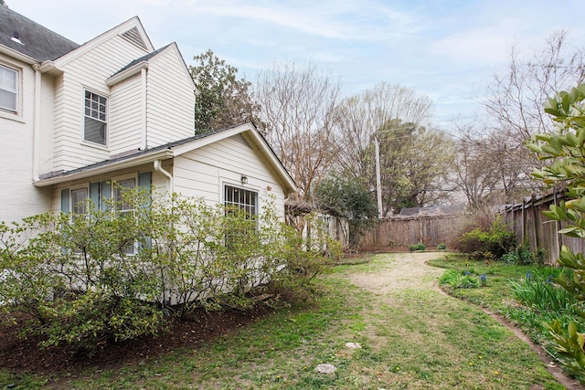 view of yard with fence
